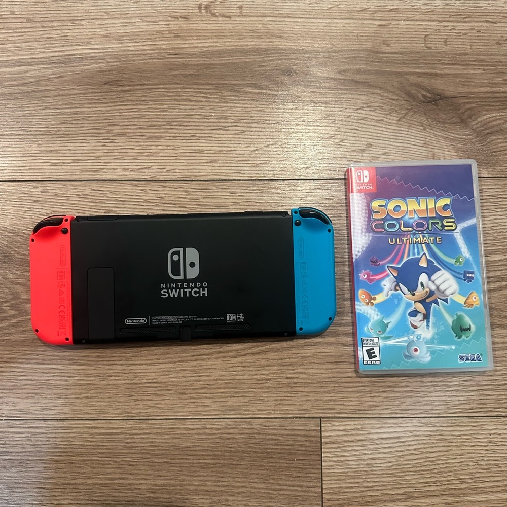 Nintendo Switch Console with Red and Blue Joy-Con